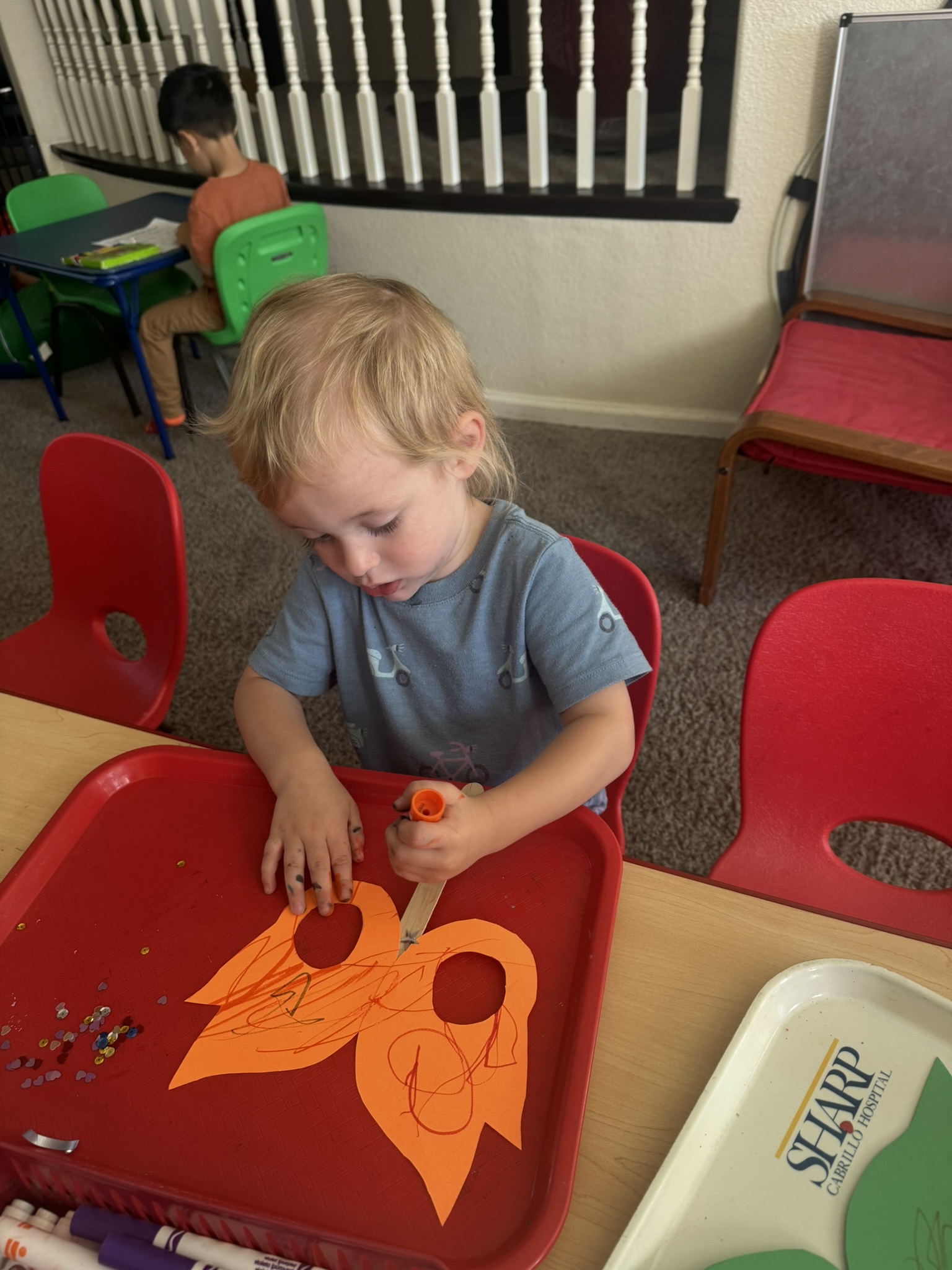Child doing arts and crafts